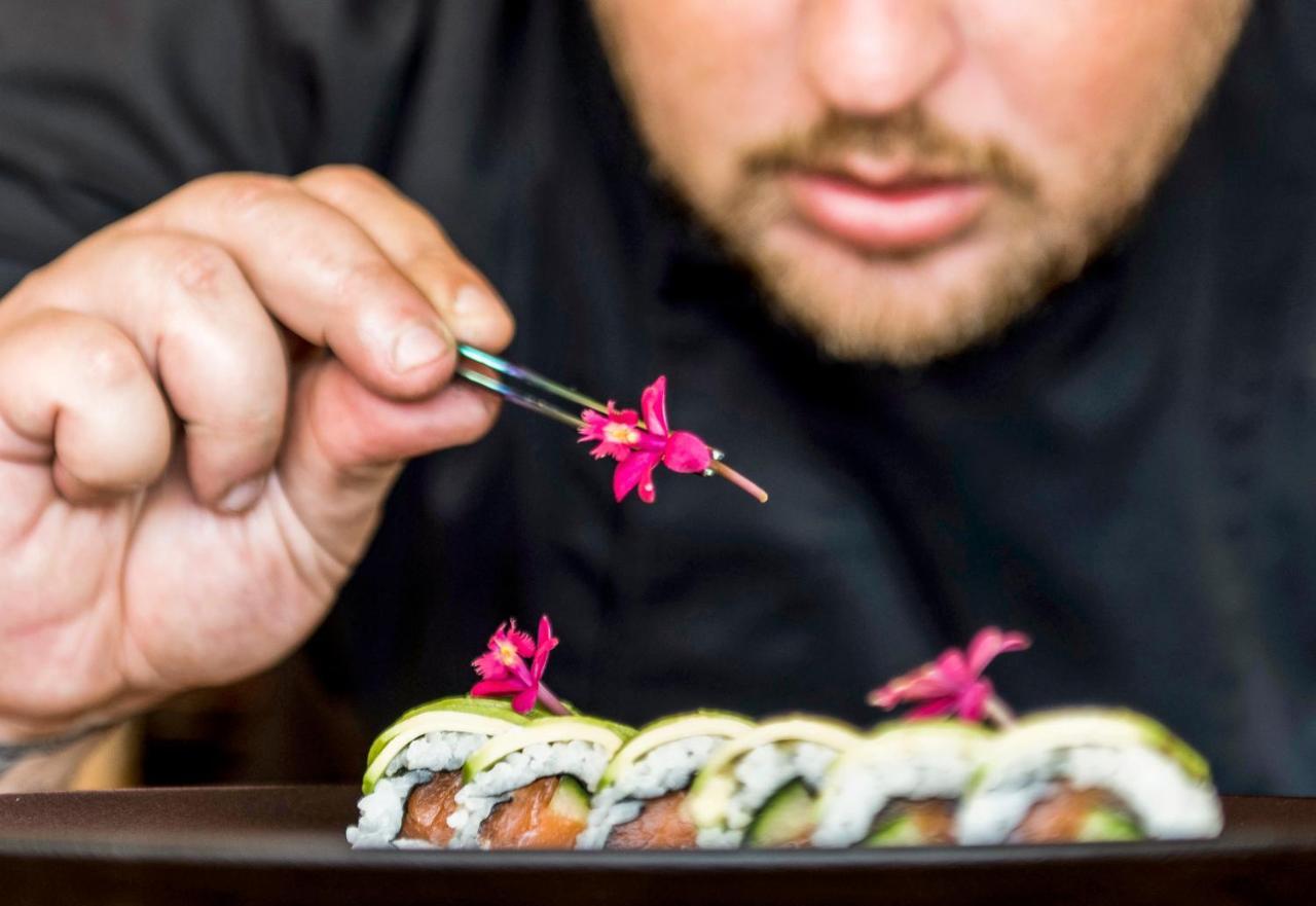 Mitsis Grand Hotel Rhodes City Екстер'єр фото A sushi chef finishing a sushi roll
